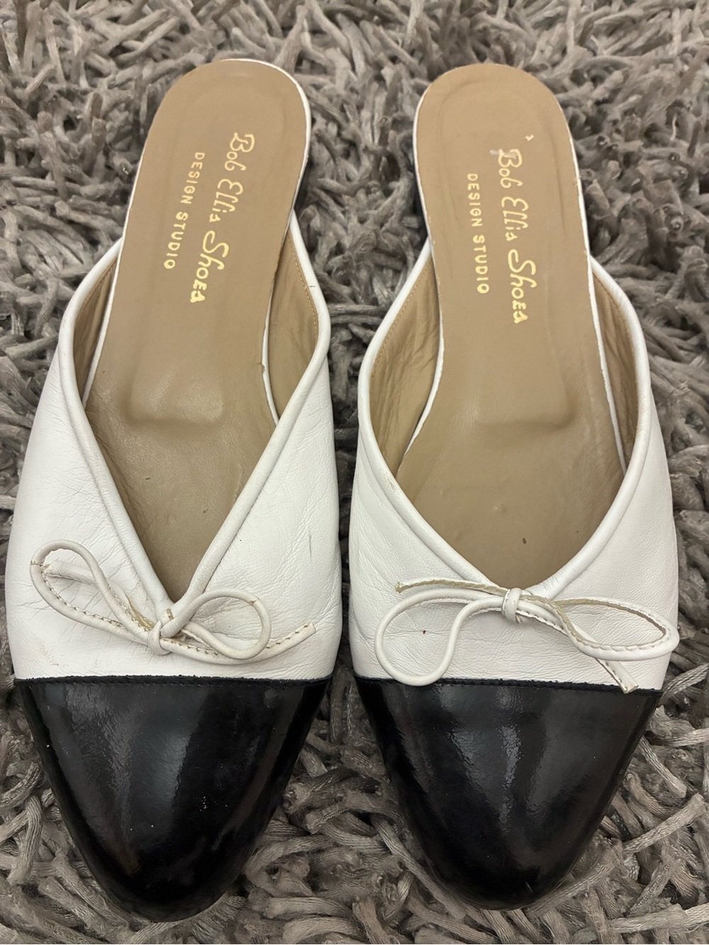 White and Black Leather Bow-Accent Mules